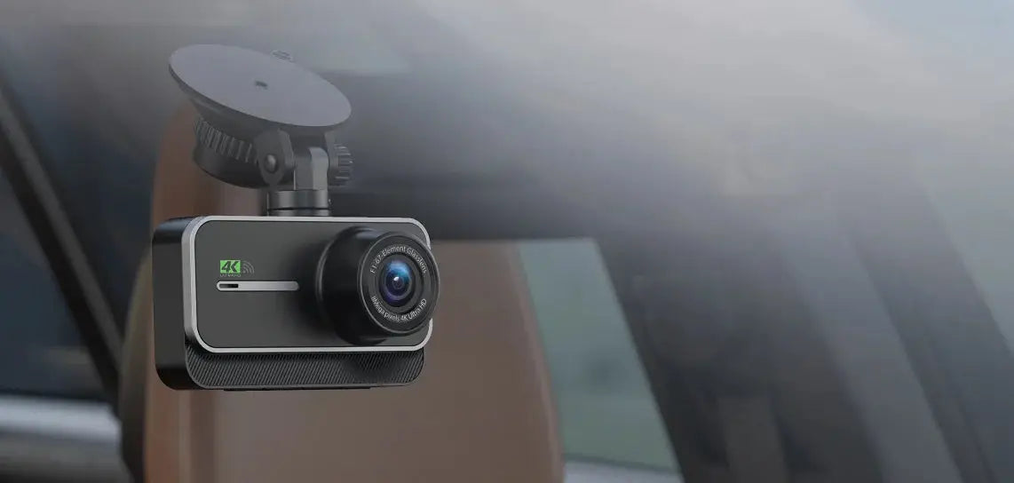 4K dash cam for cars, front-facing, black with silver trim, mounted on windshield with suction mount.