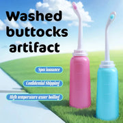 Simples Market 500ml portable handheld bidet spray bottles, pink and blue, 2-pack for travel and cleansing.
