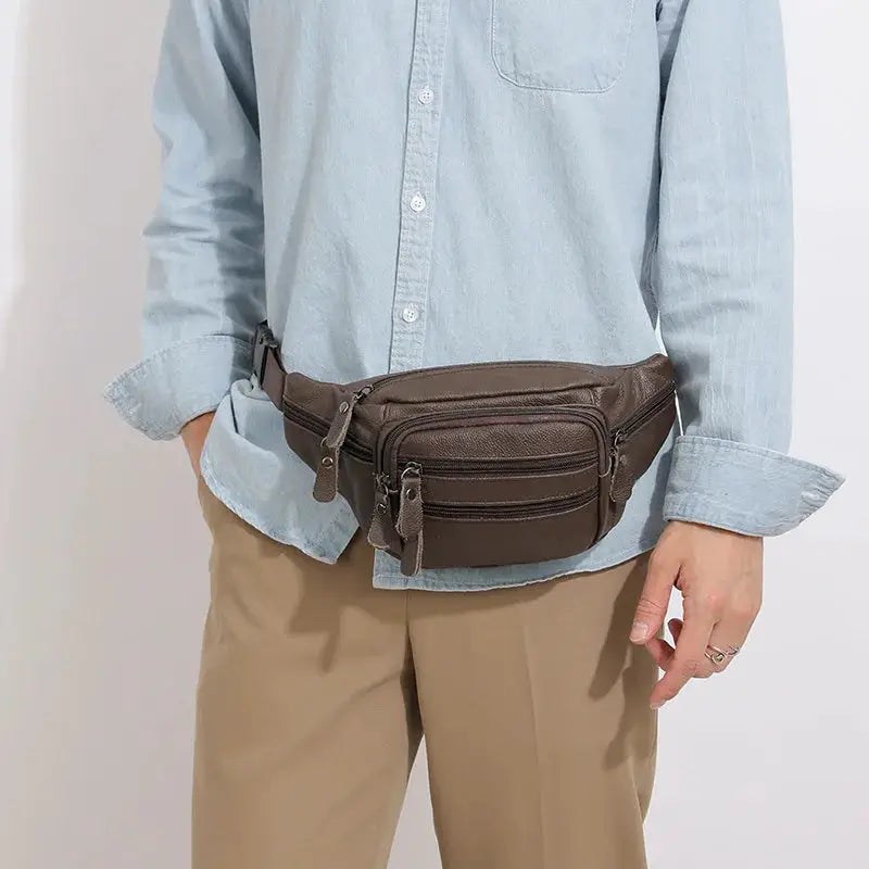 Men's genuine leather fanny pack waist bag by Simples Market, brown with multiple zip pockets.