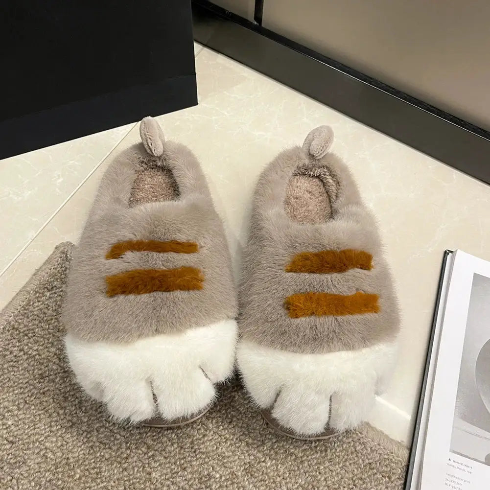 Pair of beige 3D cat-paw plush slippers with fluffy fur and orange-brown stripes