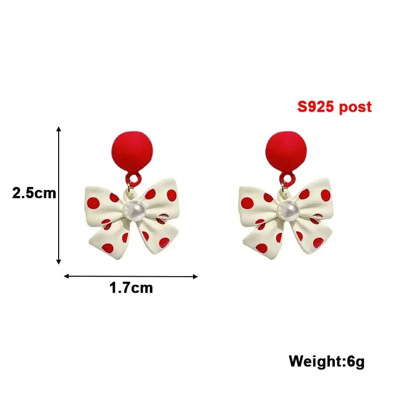 Pair of white bow dangle earrings with red polka dots and pearl centers, S925 posts