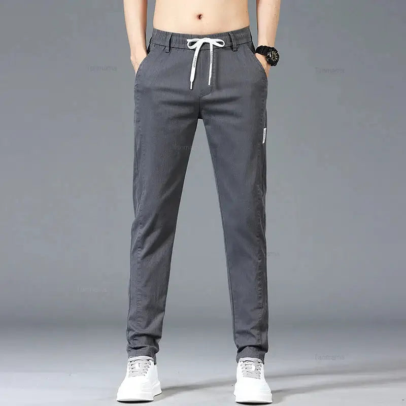Men's casual pants by Simples Market, blue-gray slim straight trousers with elastic drawstring waist.