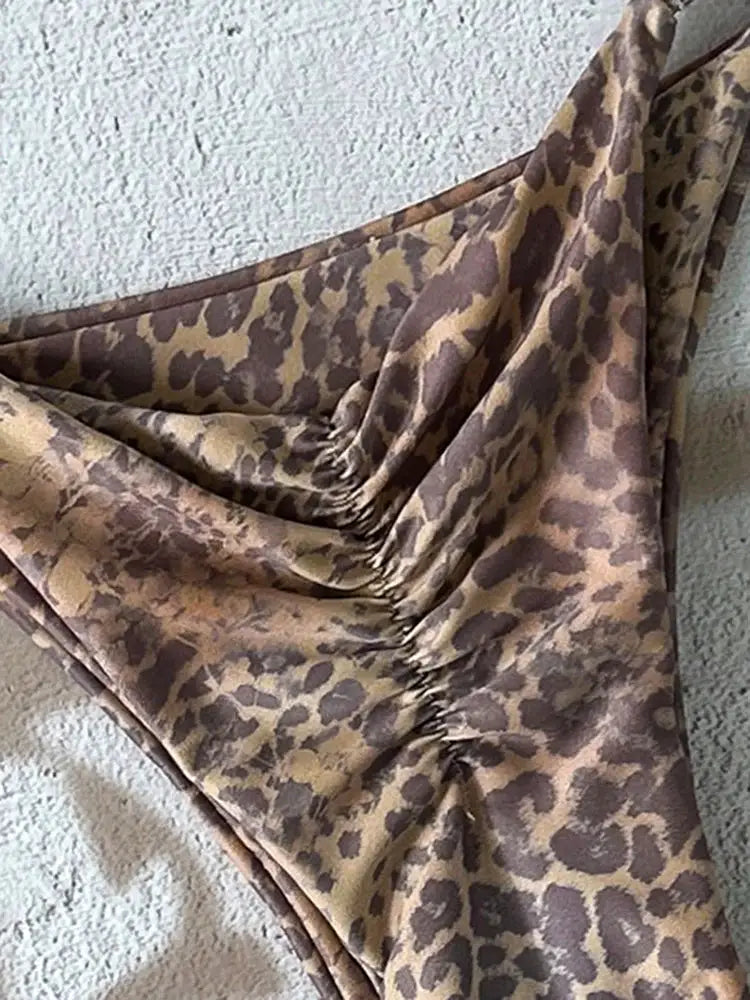 Leopard print bikini bottoms with ruched sides from a two-piece swimsuit set