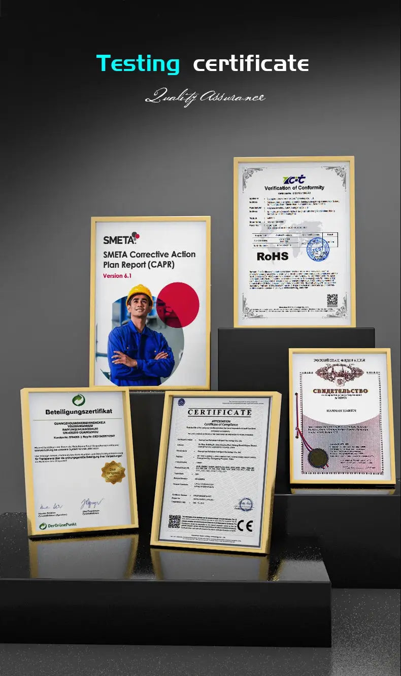 Five framed certificates and diplomas displayed on black display stands.