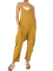 Mustard yellow women's loose-fit jumpsuit with spaghetti straps and large patch pockets