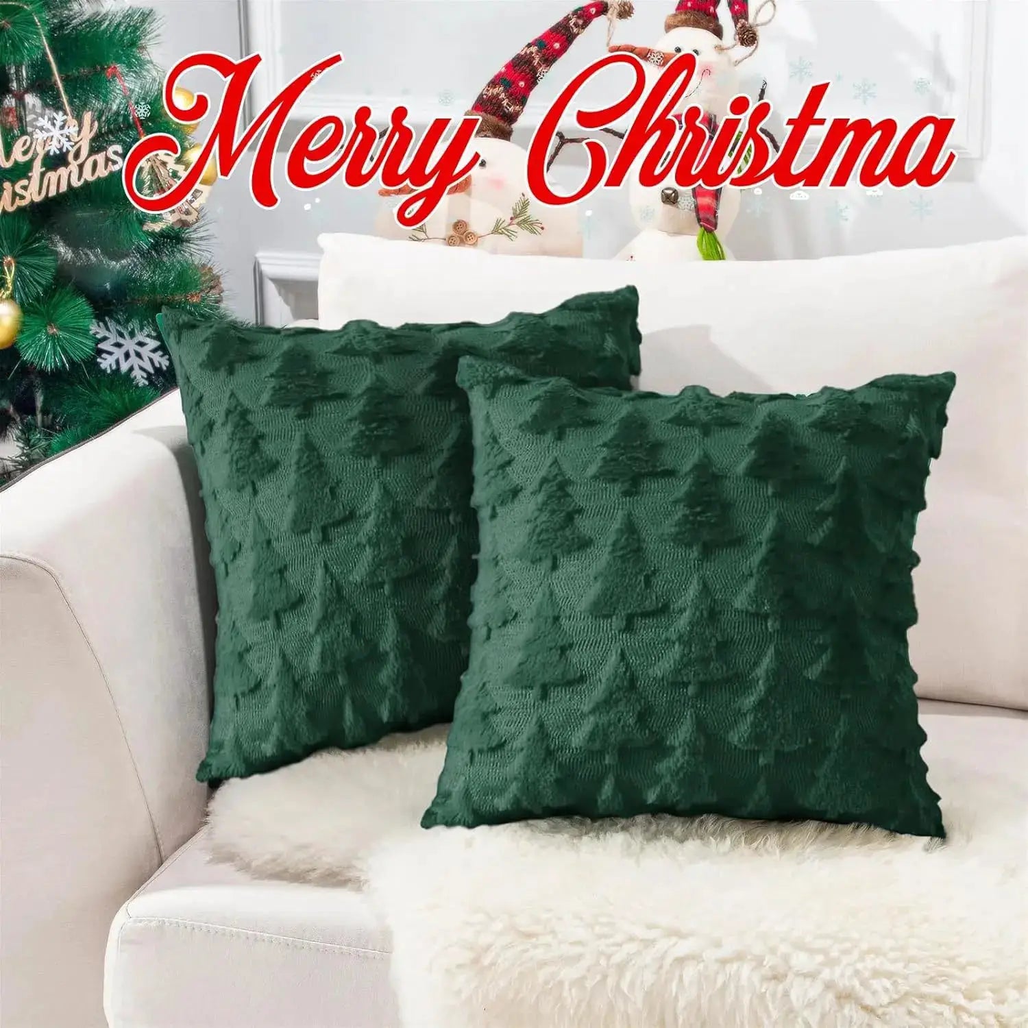 Two green textured Christmas throw pillow covers 18x18 on a white sofa