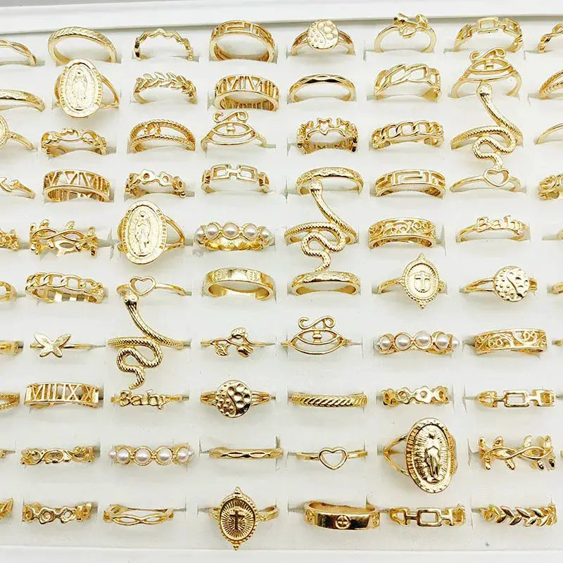 30-piece gold color finger rings set for women featuring butterfly, pearl, star and snake designs