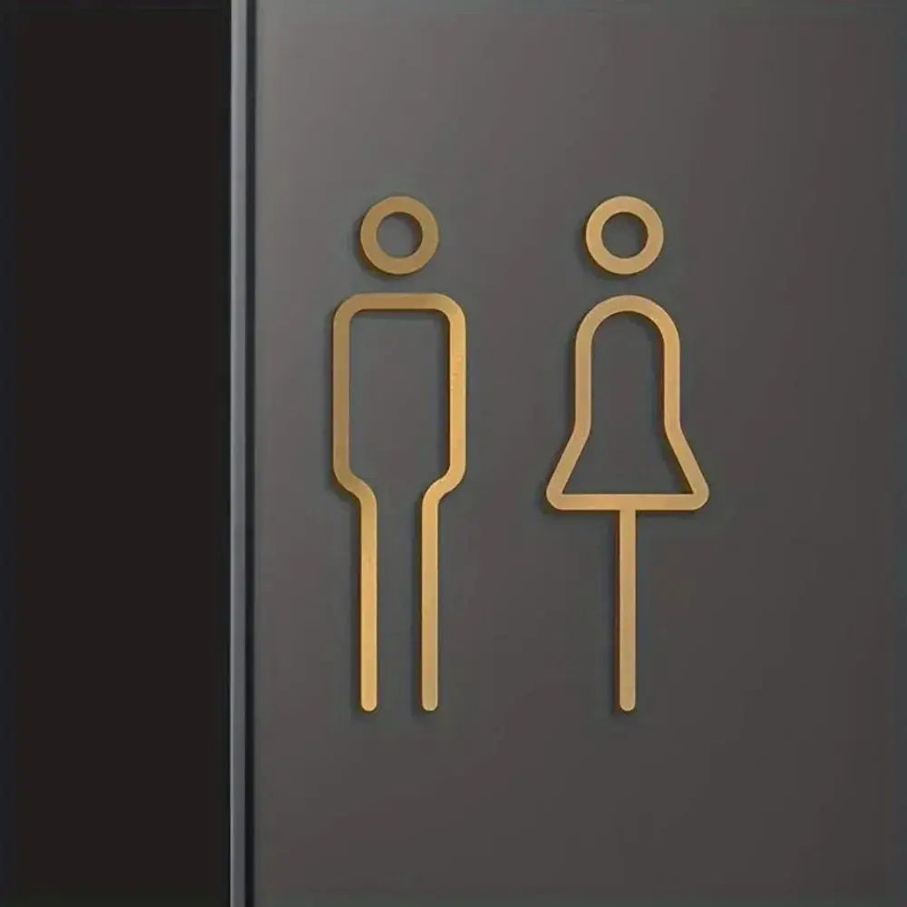 Door sign with 2 gold-tone 3D restroom icons male and female for toilet door