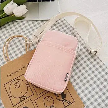 Simples Market pink vertical shoulder bag for women with white strap, casual crossbody phone and card holder