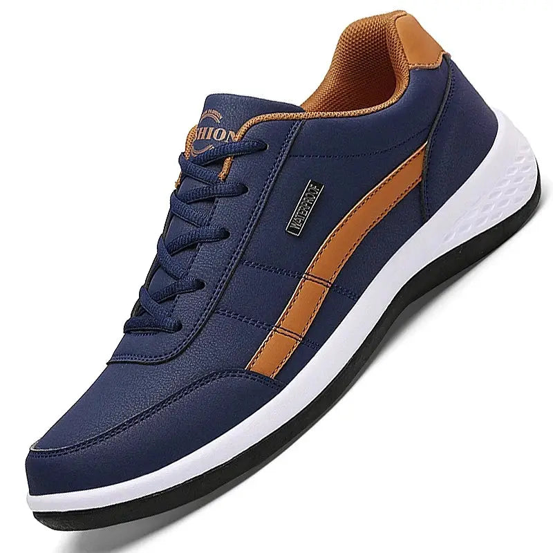Leather men's navy sneakers with brown side stripe, white midsole, black outsole.