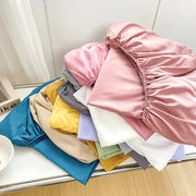 Fitted bed sheet with elastic band in assorted solid colors; anti-slip mattress cover