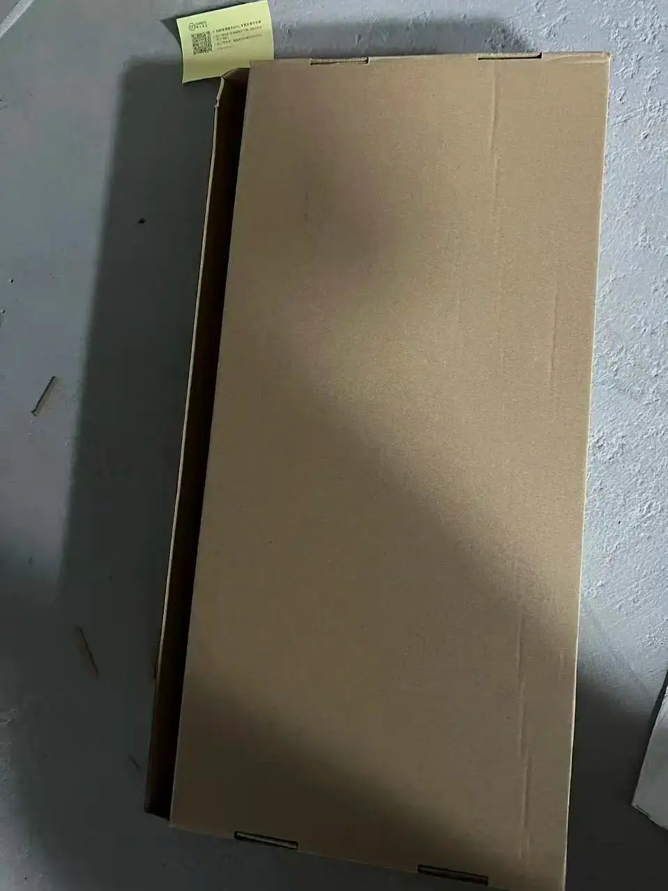 Stainless steel kitchen faucet packaging box; long brown cardboard.