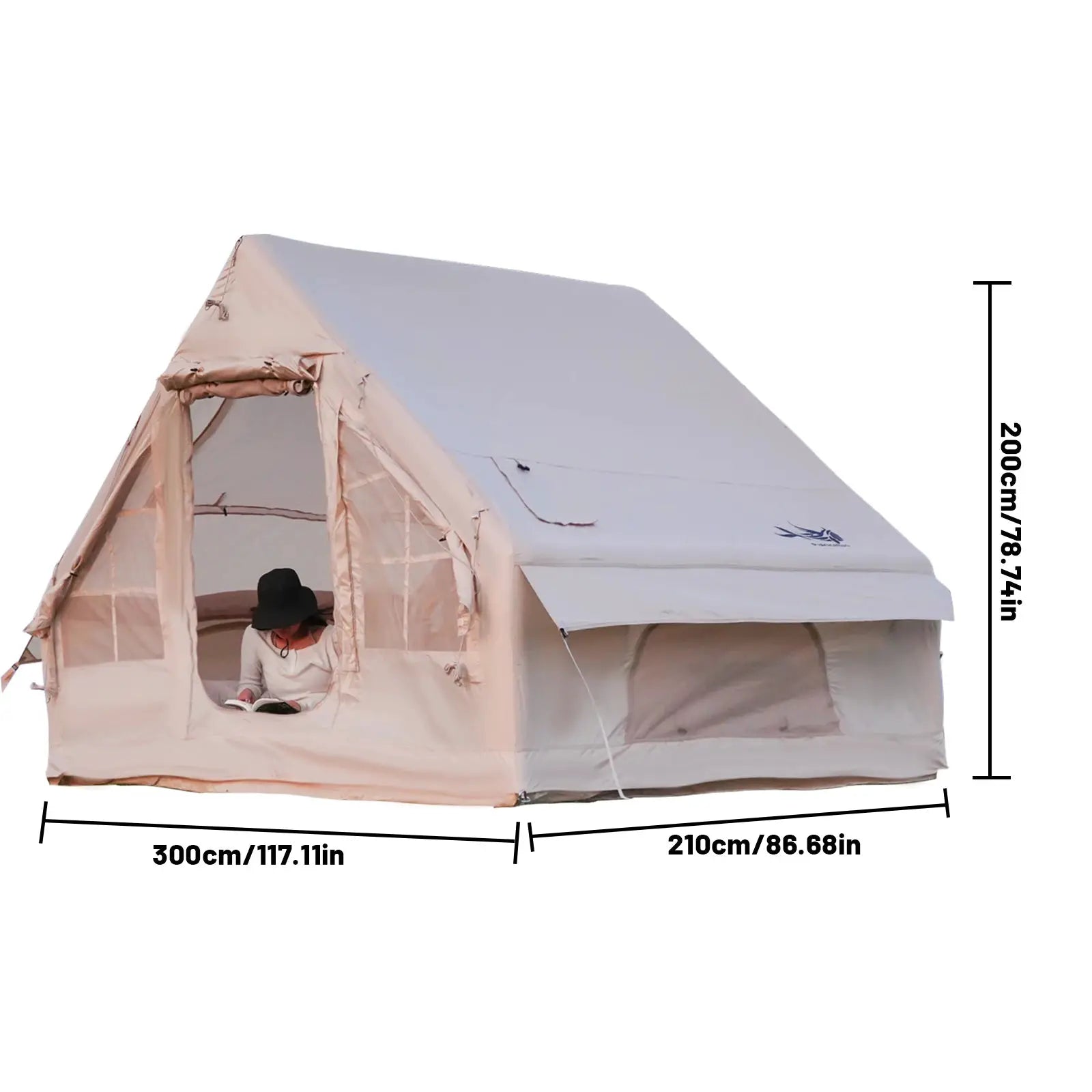Beige inflatable family camping tent with open front entrance; person reading inside.