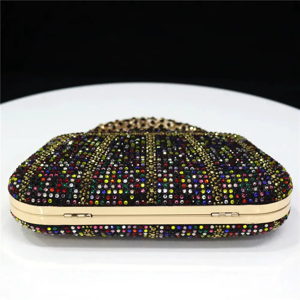Rhinestone-embellished evening clutch with multicolor stones and gold-tone metal frame