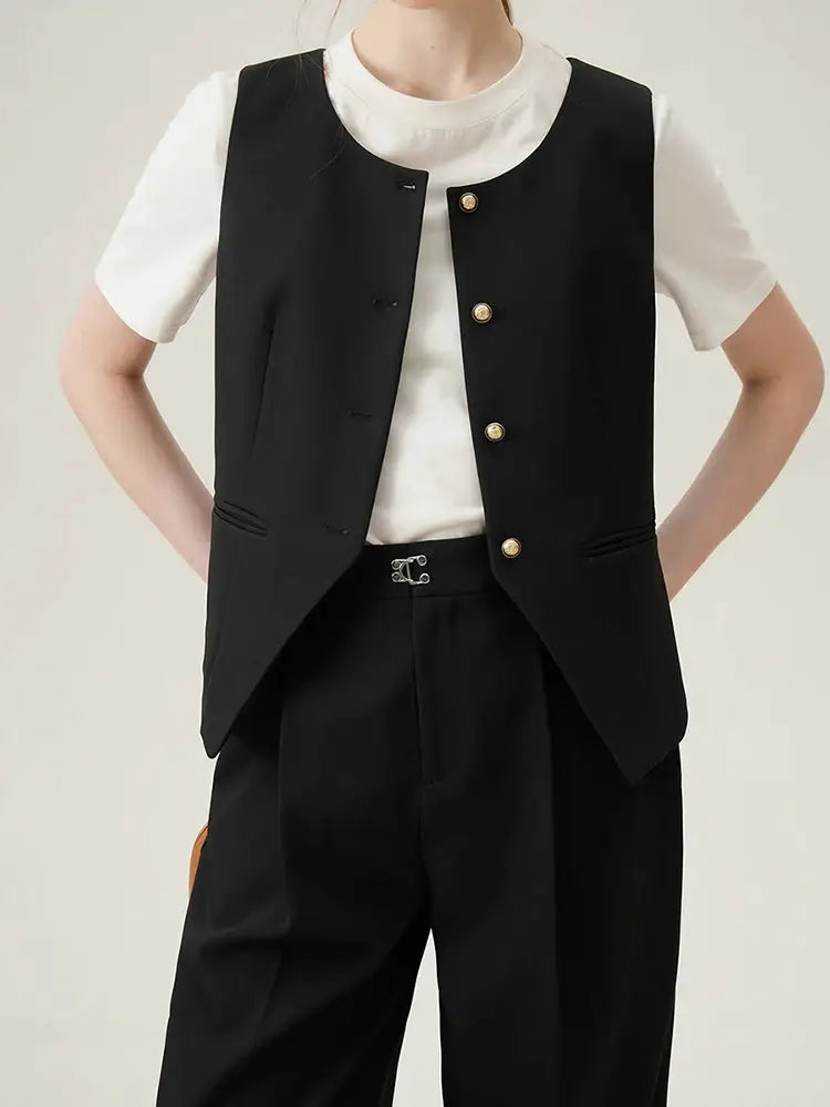 FSLE women black sleeveless blazer with gold buttons over white top, matching black pants suit for office wear