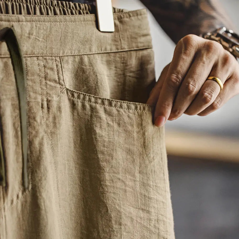Maden linen-blend chino pants with elastic waist in khaki, pocket detail