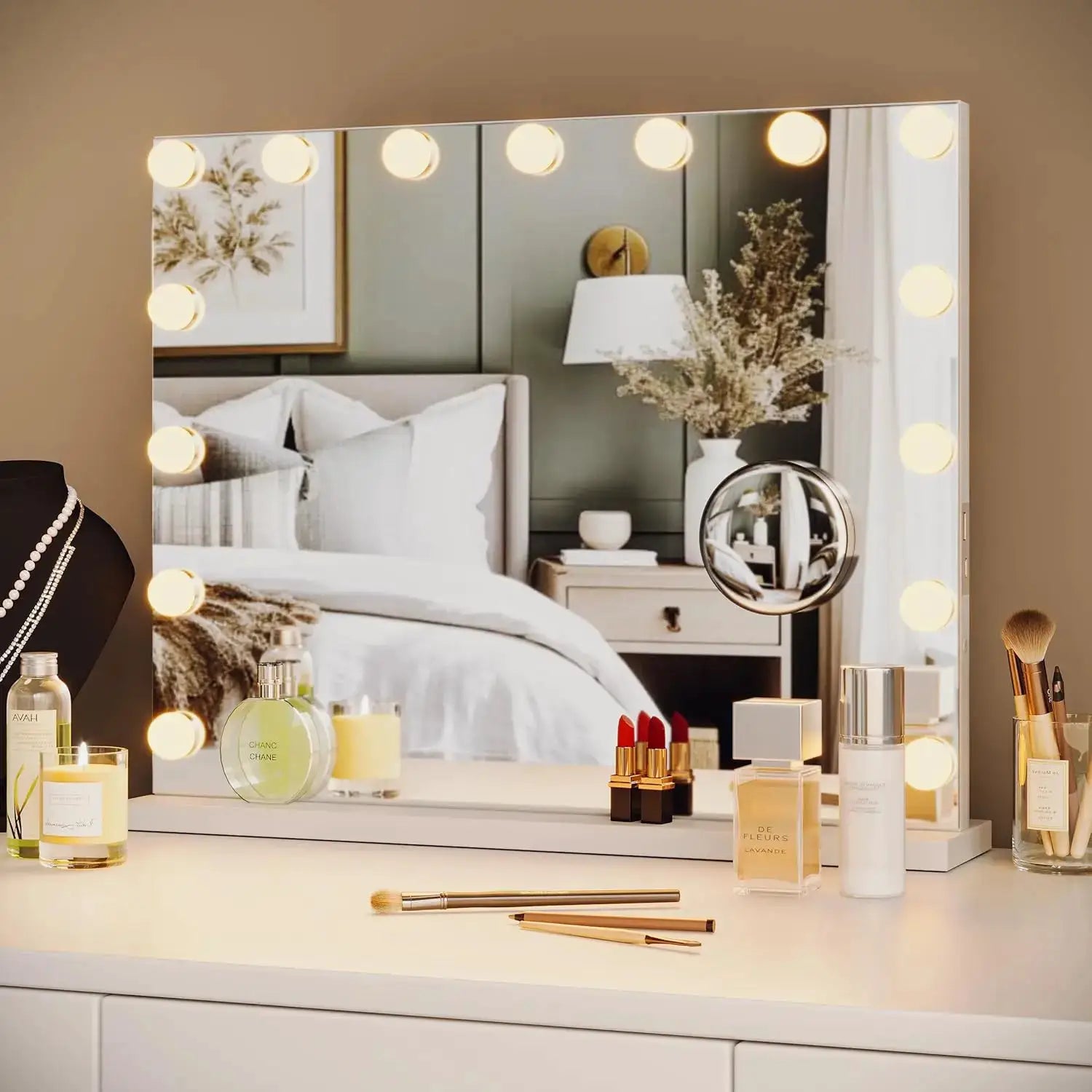 Vanity mirror with adjustable LED bulbs and 3x magnification, on a white makeup dresser with cosmetics.