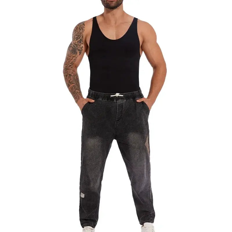 Two-piece men's sleeveless shapewear vest and dark gray jogger pants by Simples Market