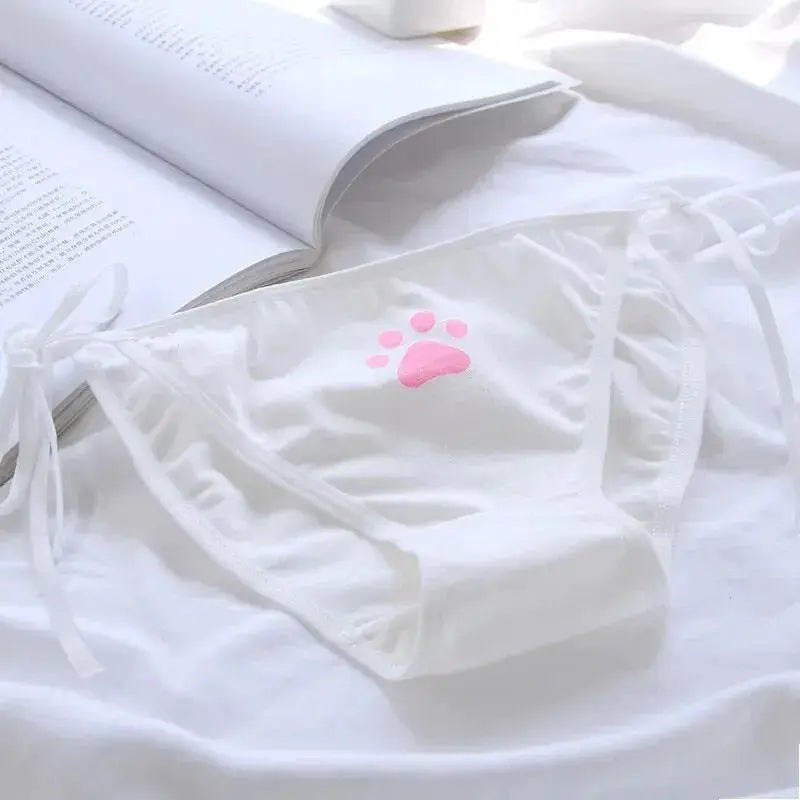 Women's cotton panties with pink paw print and side ties.