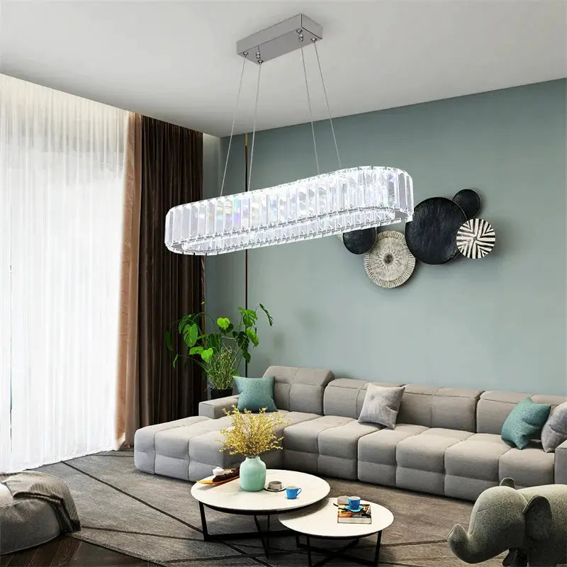 Modern crystal ring LED chandelier pendant lamp with chrome finish.