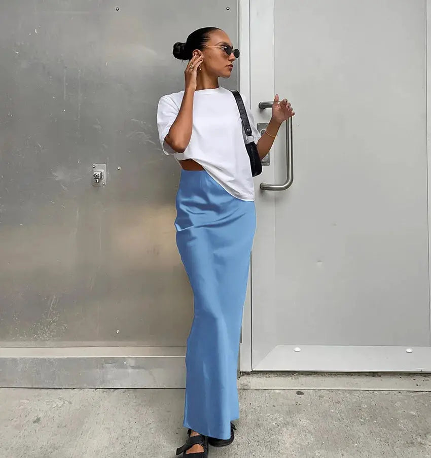 Satin trumpet skirt in light blue, high-waist, long length worn by model