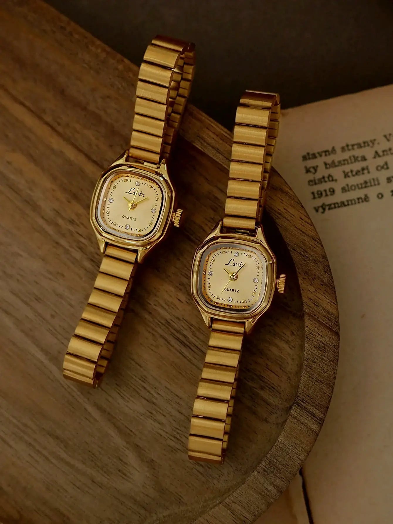 Women's gold square-faced quartz watches by Simples Market; set of 2 with stainless steel bracelets.