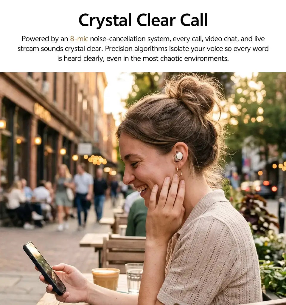 QCY MeloBuds A30 wireless earbuds, white in-ear headphones worn by a woman at an outdoor cafe