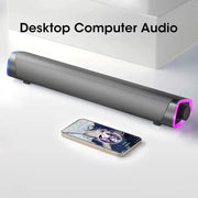 Niye Bluetooth Speaker Bar with Subwoofer for PC, long black desk speaker with blue and purple LED accents.