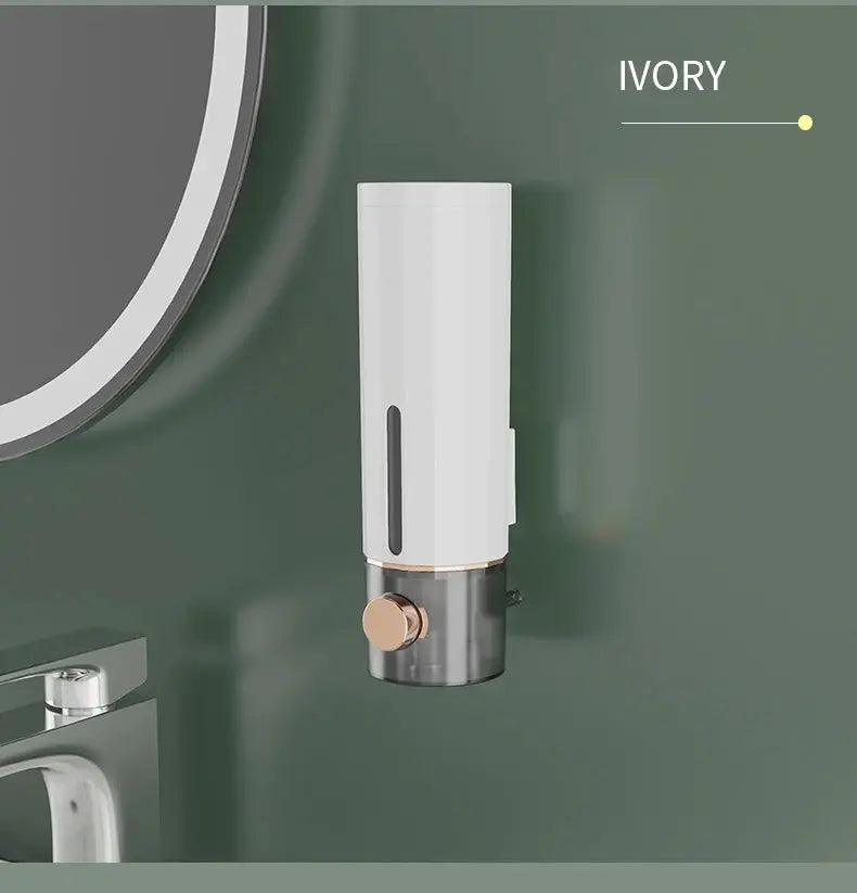 Manual soap dispenser wall-mounted, ivory finish with copper accent for bathrooms.