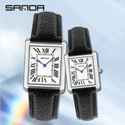 SANDA luxury couple quartz watches pair with black leather straps, silver cases, white Roman-numeral dials.