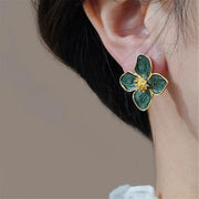 Gold Tone Metal Flower Shape Stud Earrings With Green Epoxy And Milky White Enamel Ins Fashion Jewelry