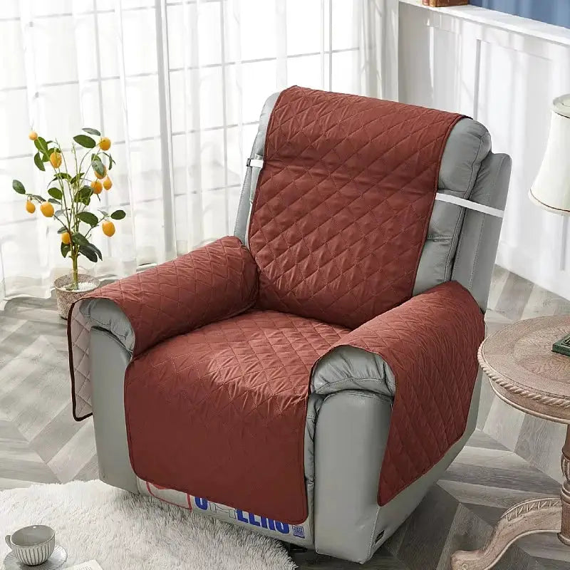 Recliner chair slipcover in solid red quilted fabric with anti-slip backing