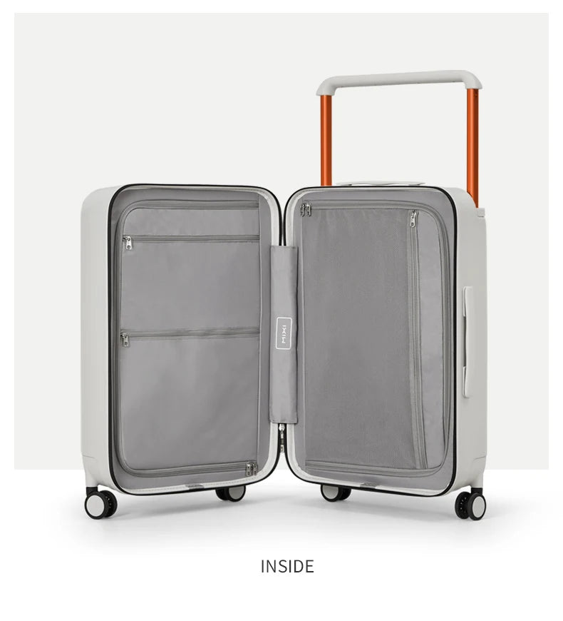 Mixi hardside travel luggage suitcase by Simples Market, grey interior with zip pockets and orange handle.