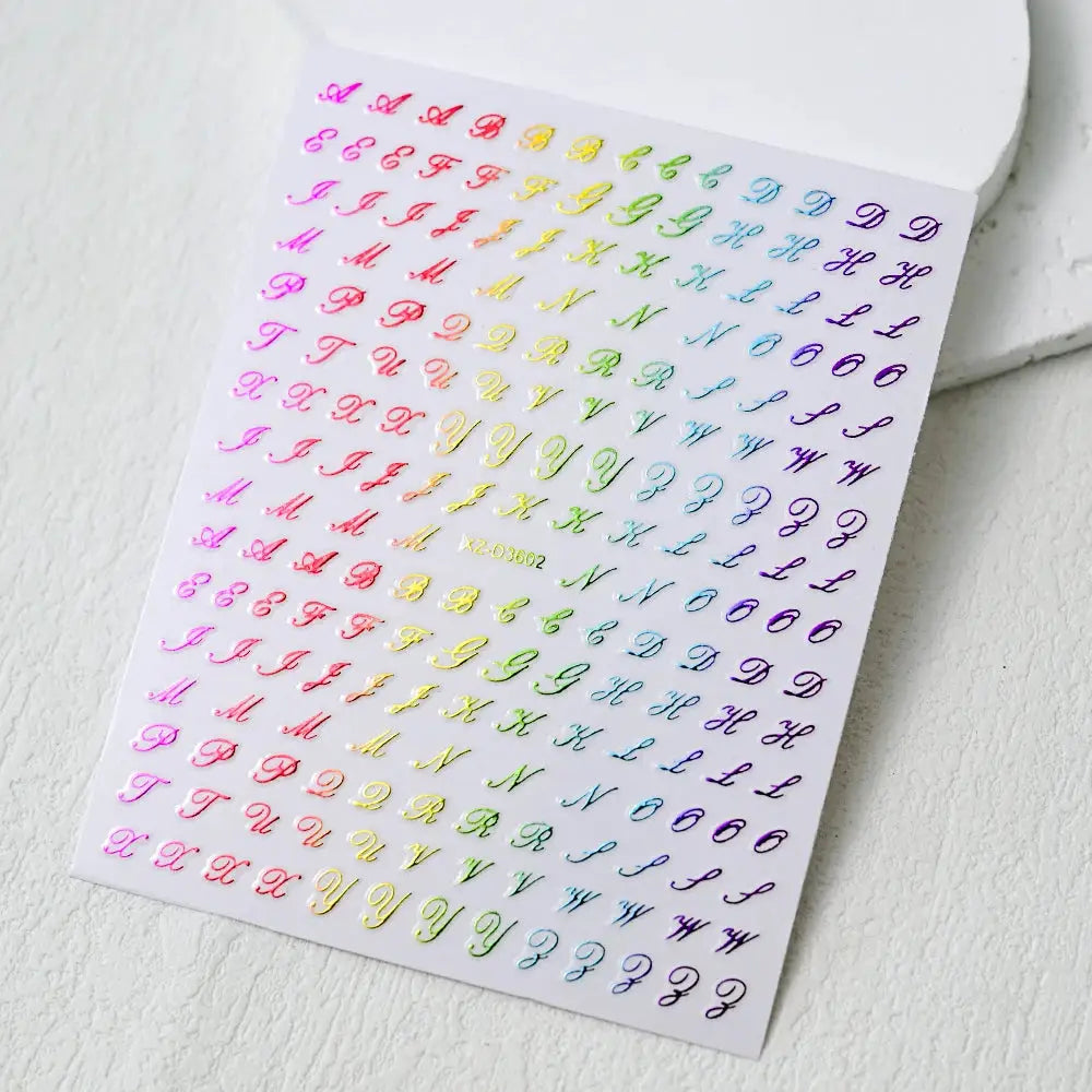 Sheet of 3D Roman letter nail stickers with metallic rainbow colors for manicures