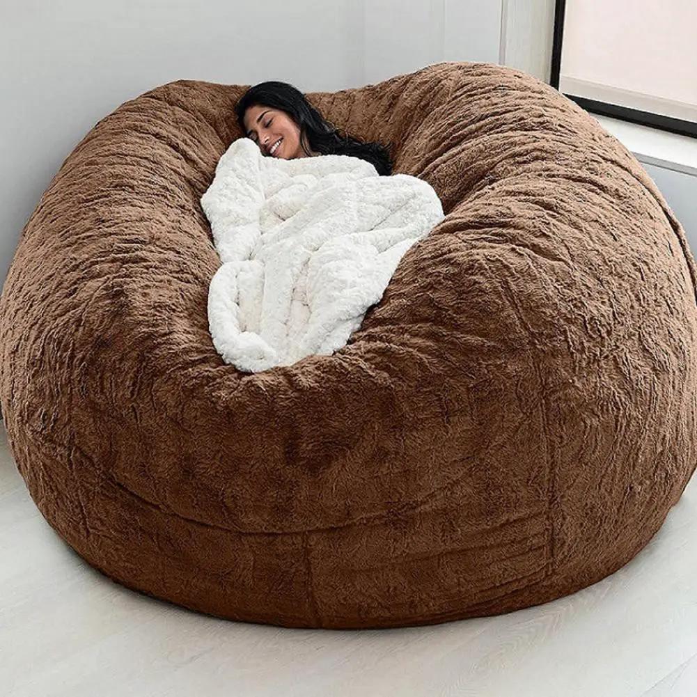Simples Market brown plush giant bean bag sofa bed with white blanket, oversized lounge chair.