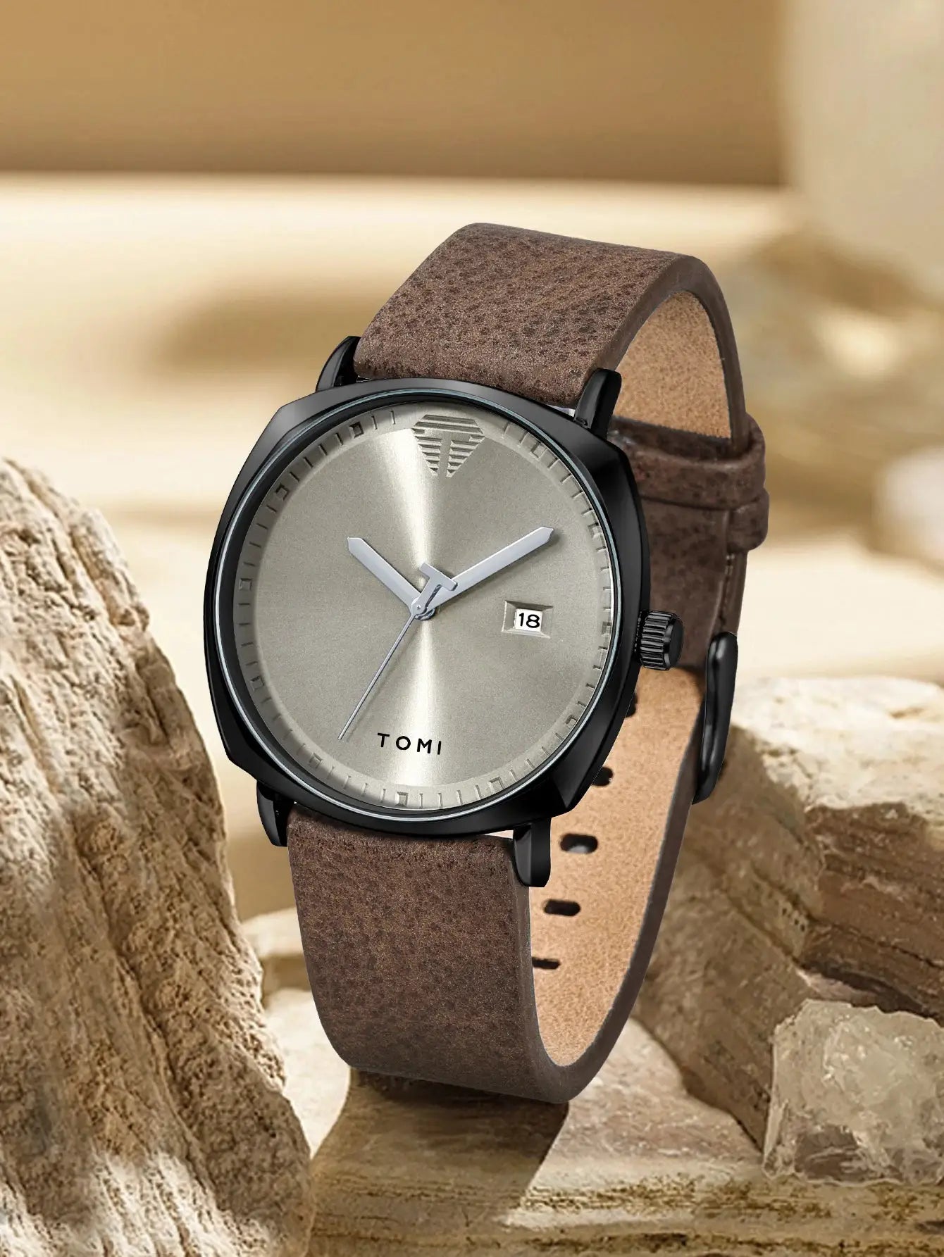 TOMI men's minimalist watch with brown distressed leather strap, black case, silver dial and date window.