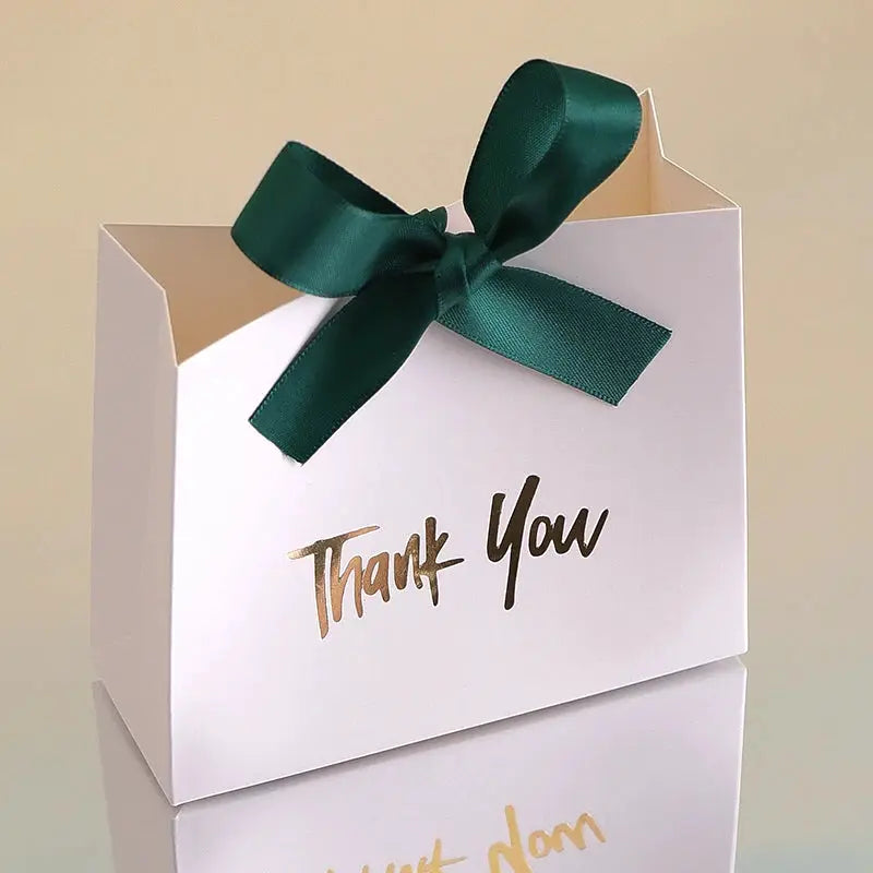 Mini white gift box with dark green ribbon bow and gold Thank You text