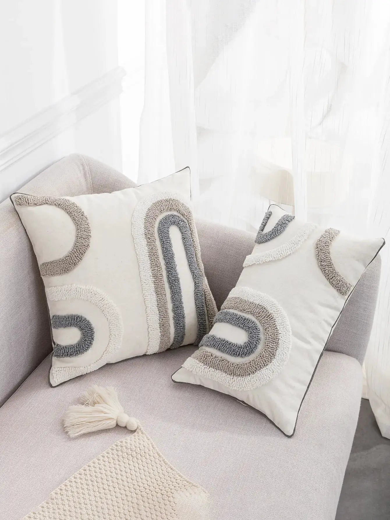 2 white pillow covers with gray and beige U-shaped boho embroidery for sofa or living room