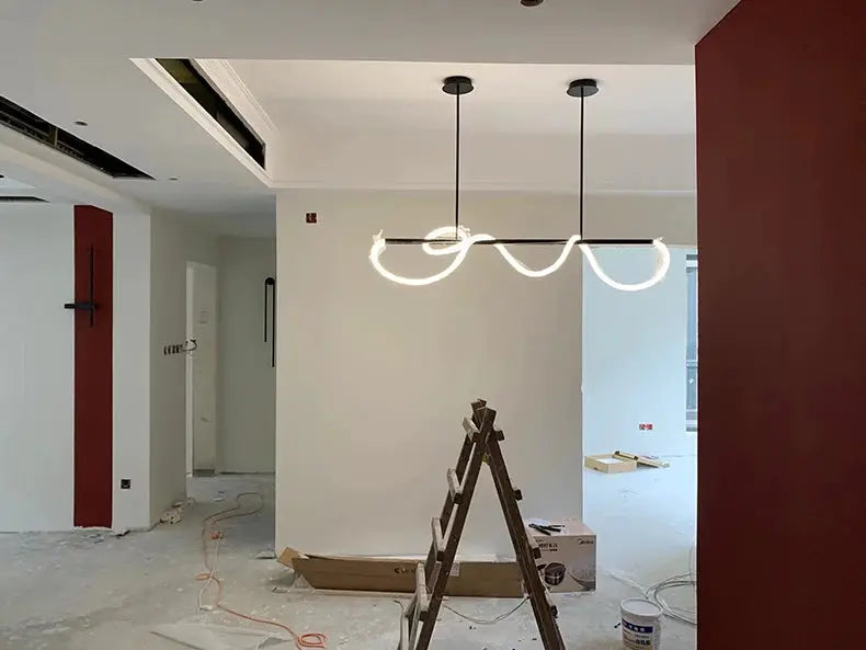 Nordic double-loop pendant chandelier by Simples Market with LED light rings and black cords