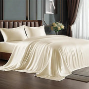 Mulberry silk bedding set in cream for bed; duvet cover and pillowcases included.