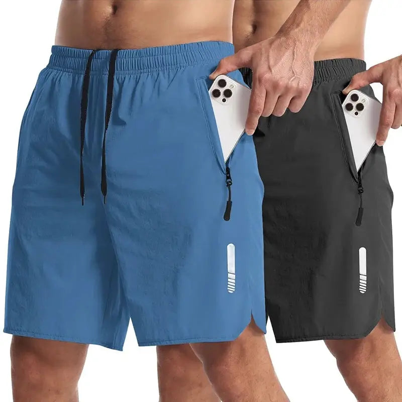 Set of two men's sport shorts in blue and black with zip pockets and drawstring waist.