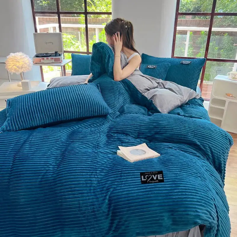 3pc duvet cover set in blue coral fleece with pillowcases on a bed by Simples Market