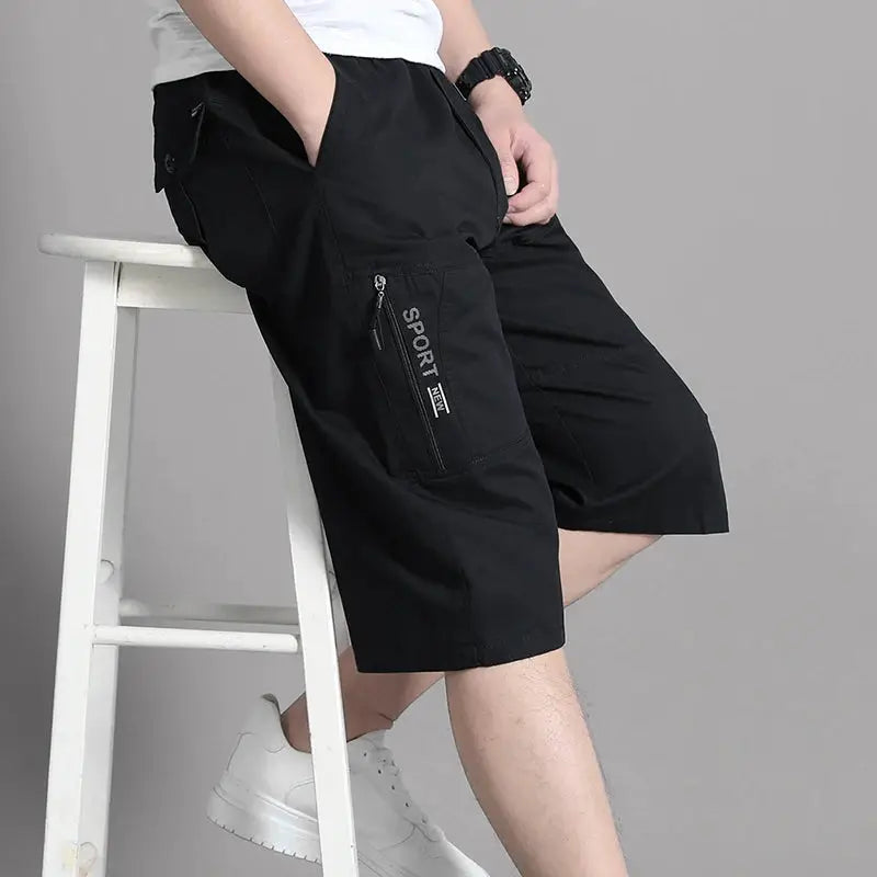 Mens black cargo shorts with zippered side pocket, knee-length, elastic waist, casual outdoor sportswear