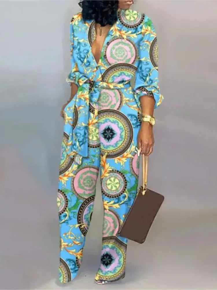 Simples Market women’s long-sleeve jumpsuit with blue circular mandala print, waist belt, wide-leg pants