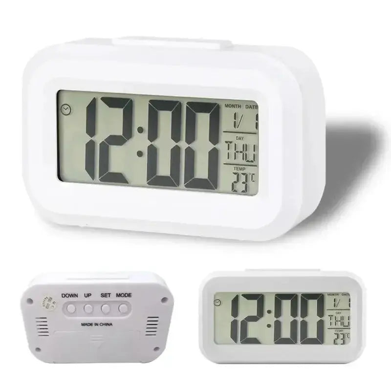 Simples Market LED digital alarm clock with backlight, white plastic body showing time, date and temp.