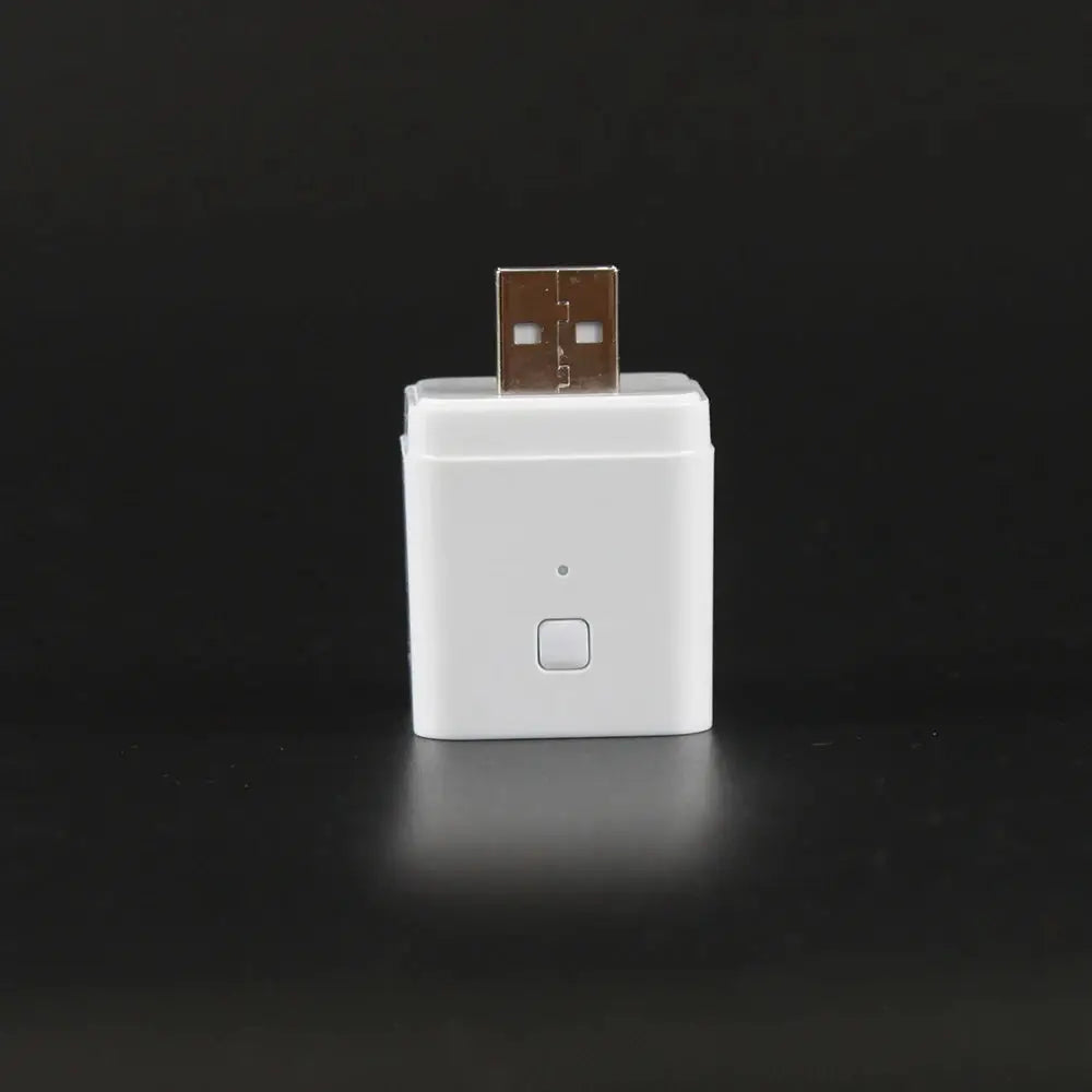 White 5V WiFi USB power adaptor with USB-A plug, LED indicator, and square button.