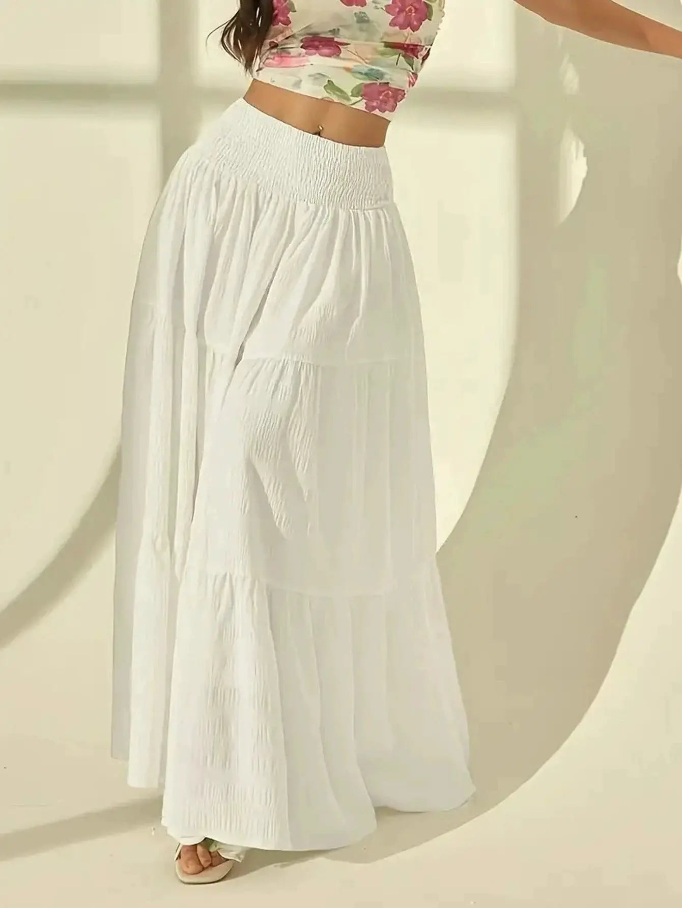 Simples Market white tiered maxi skirt with a high-waisted elastic waistband, pleated and flowing for summer