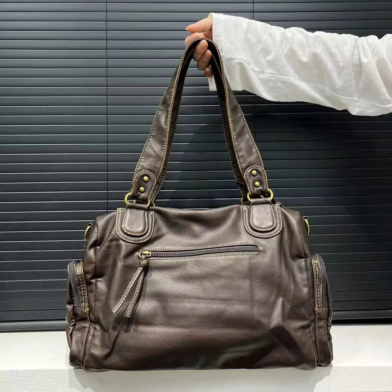 Y2K Hot Girl crossbody bag in vintage washed brown leather with multiple pockets and tassel zipper