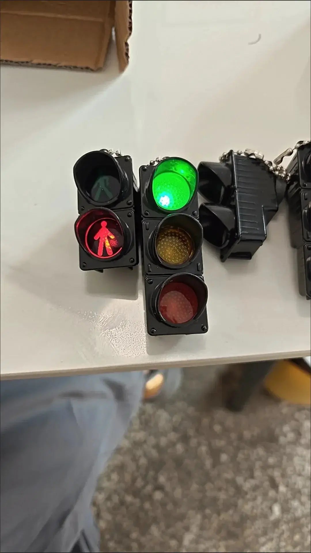 Simples Market traffic light magnetic fridge set; four black units with red pedestrian symbol, green and yellow signals