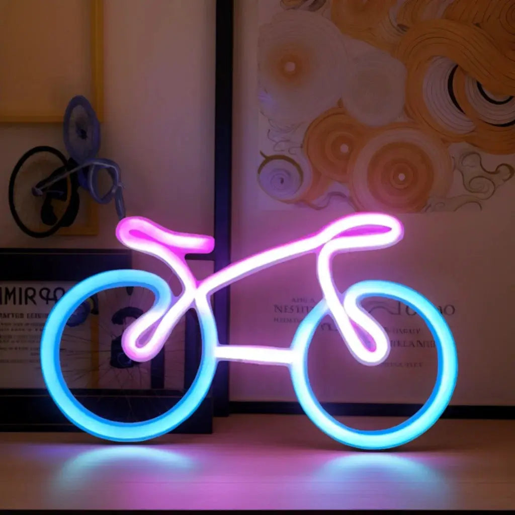 Decorative neon bicycle sculpture in pink and blue by Simples Market, USB or battery powered.